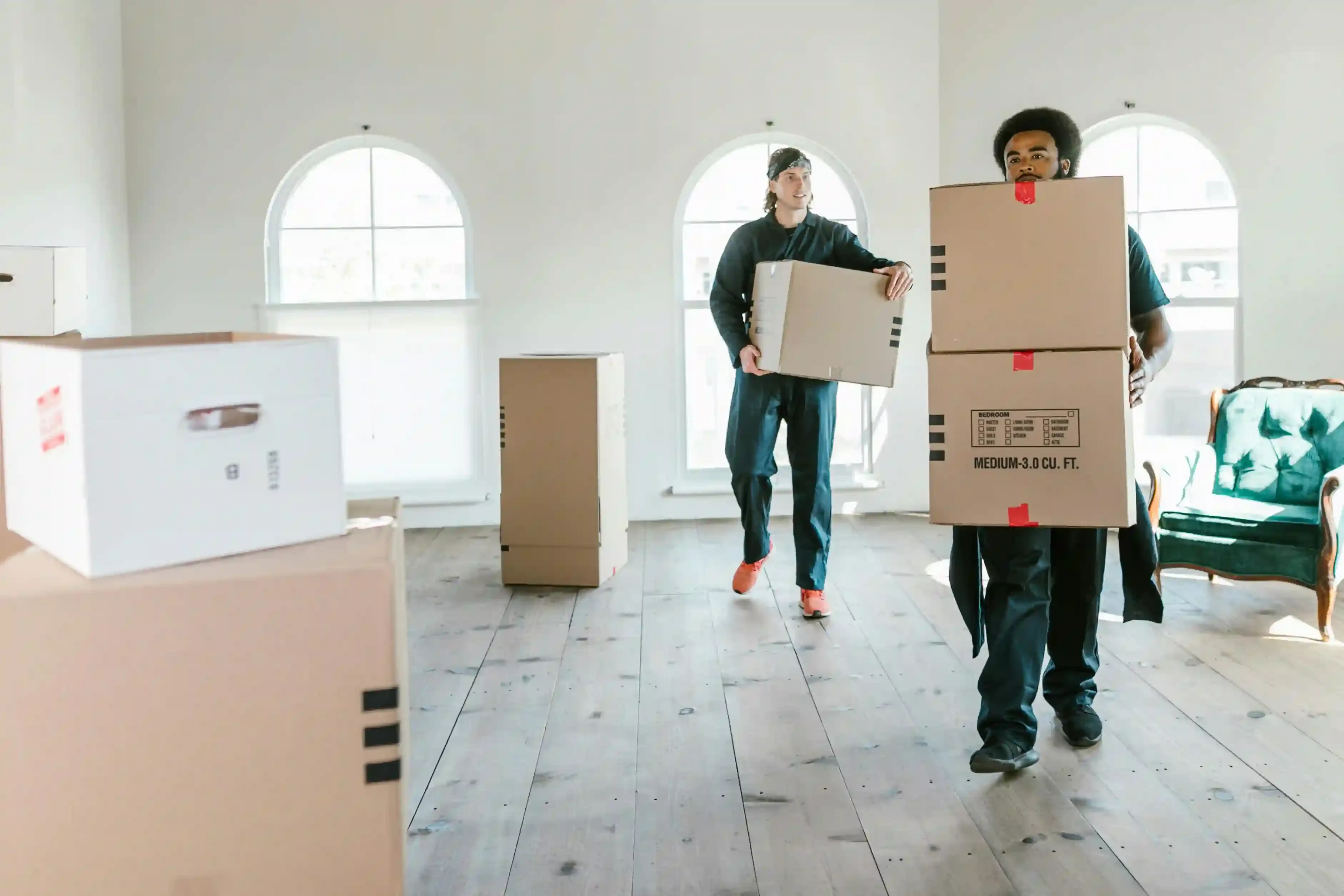 Movers moving couch